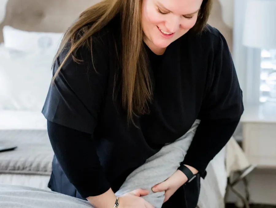 A physical therapist setting up for an in-home visit